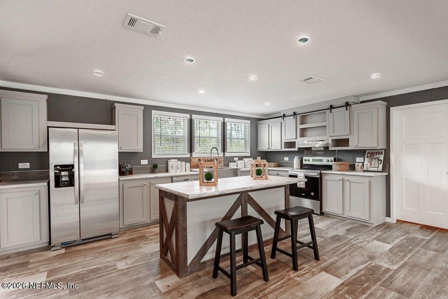Furnished interior view inside a new home in , Florahome (Image 10).