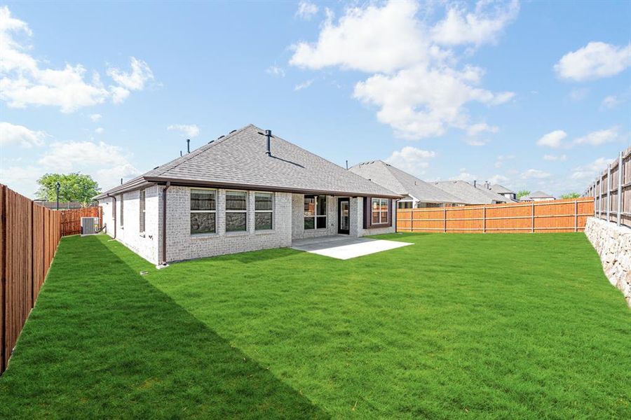 Front exterior of a new home in Mockingbird Heights Classic 60, Midlothian, TX, highlighting curb appeal (Image 26). Front exterior of a new home in Mockingbird Heights Classic 60, Midlothian, TX, highlighting curb appeal (Image 26).