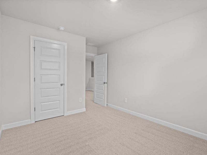 Spacious, unfurnished interior of a new home in Crossing at Abner Creek Townes, Greer (Image 16).