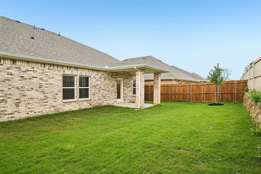 Exterior details and patio area of a home in Summerwood Estates, Red Oak (Image 18). Exterior details and patio area of a home in Summerwood Estates, Red Oak (Image 18).