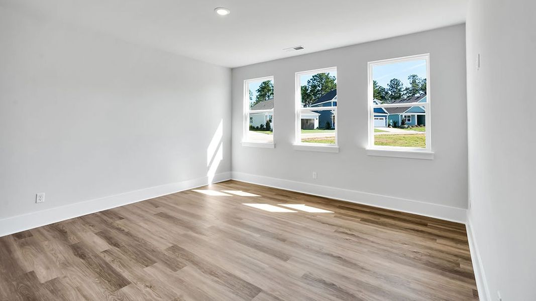 Spacious, unfurnished interior of a new home in The Haven at Indigo Preserve, Leland (Image 17).