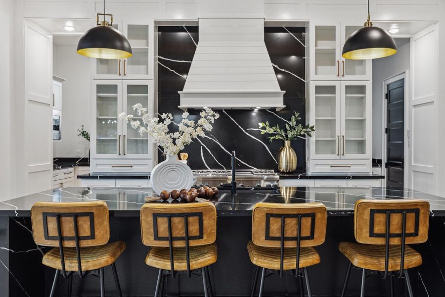 Kitchen island is the centerpiece of this gourmet kitchen Kitchen island is the centerpiece of this gourmet kitchen