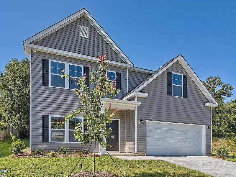 Front exterior of a new home in Emanuel Creek, West Columbia, SC, highlighting curb appeal (Image 2).