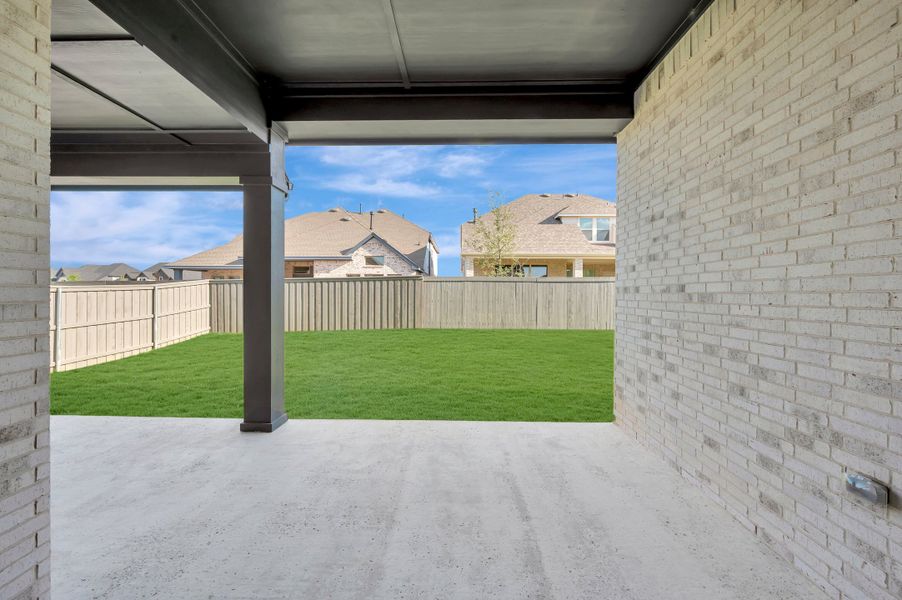 Exterior details and patio area of a home in Goodland – Manor Series, Grand Prairie (Image 4). Exterior details and patio area of a home in Goodland – Manor Series, Grand Prairie (Image 4).