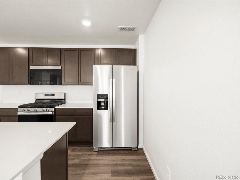 Furnished interior view inside a new home in Skyview at High Point, Aurora (Image 3).