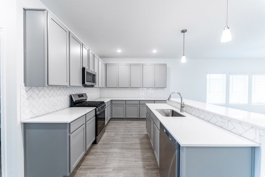 Furnished interior view inside a new home in Briarwood, Elgin (Image 4).
