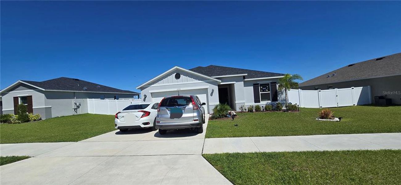 Front exterior of a new home in , Mascotte, FL, highlighting curb appeal (Image 16). Front exterior of a new home in , Mascotte, FL, highlighting curb appeal (Image 16).