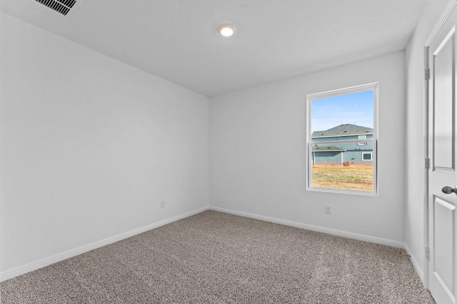 Spacious, unfurnished interior of a new home in Paramount, Kyle (Image 27).