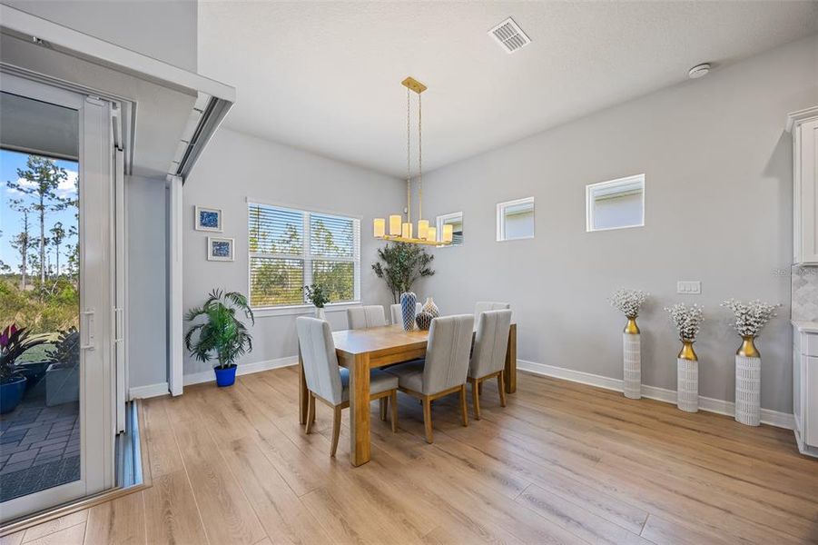 Furnished interior view inside a new home in Del Webb Sunbridge, St. Cloud (Image 27).