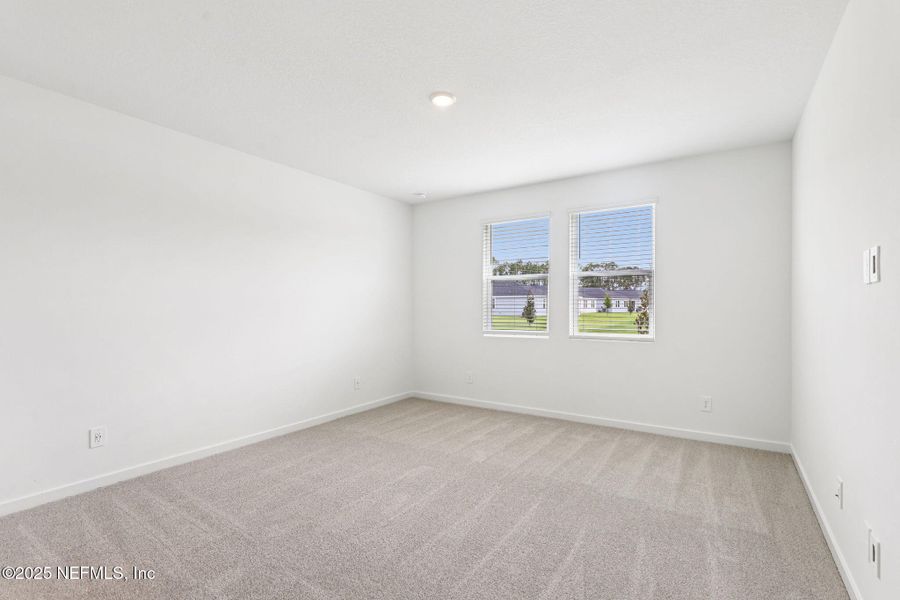 Spacious, unfurnished interior of a new home in Lakes at Bella Lago - Signature Series, Green Cove Springs (Image 24).