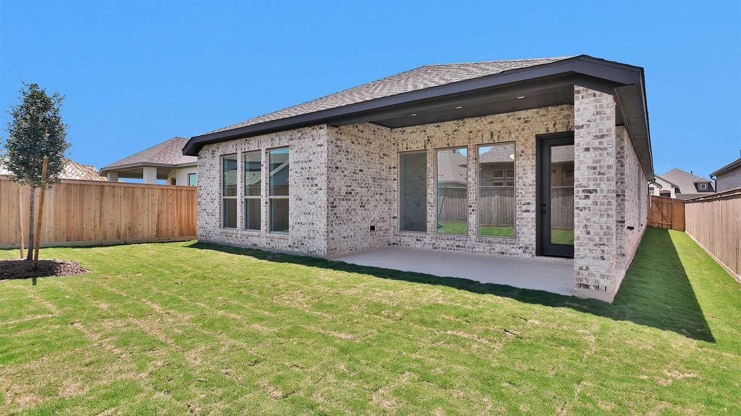 Exterior details and patio area of a home in Bridgeland, Cypress (Image 2).
