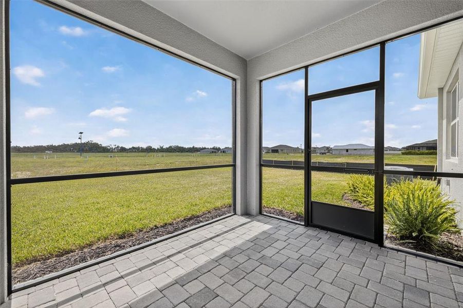Exterior details and patio area of a home in Windwater, Parrish (Image 1).