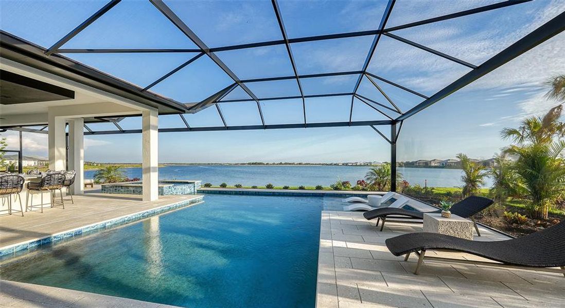 Exterior details and patio area of a home in Wild Blue at Waterside, Sarasota (Image 33).