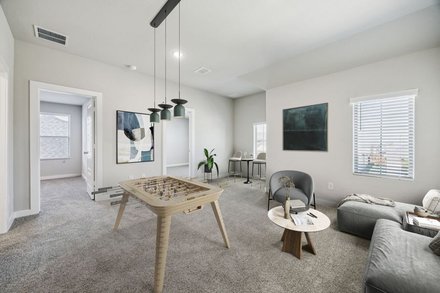 Game Room in the Holden home plan by Trophy Signature Homes – REPRESENTATIVE PHOTO