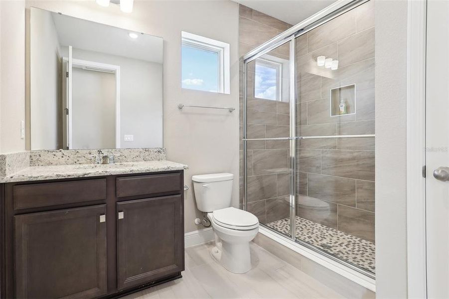 Furnished interior view inside a new home in Laureate Park, Orlando (Image 8).