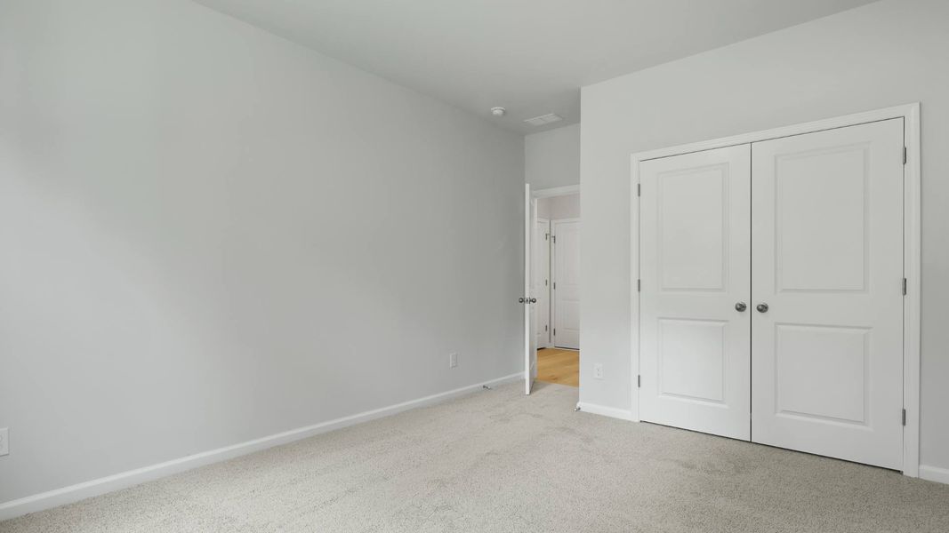 Representative unfurnished interior of a home built from the FORRESTER by D.R. Horton in Founders Corner, Summerville (Image 15).