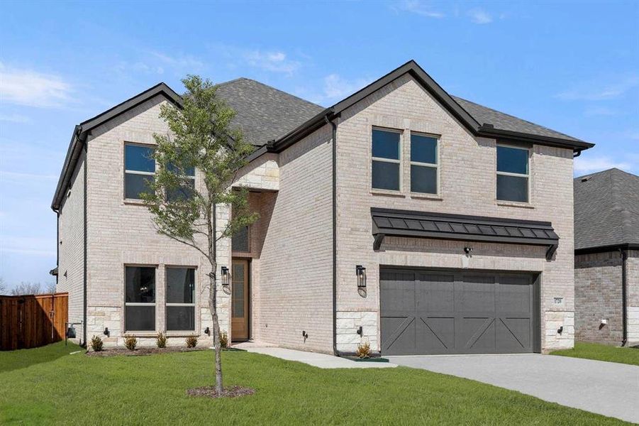 Front exterior of a new home in Valencia on The Lake, Little Elm, TX, highlighting curb appeal (Image 2). Front exterior of a new home in Valencia on The Lake, Little Elm, TX, highlighting curb appeal (Image 2).