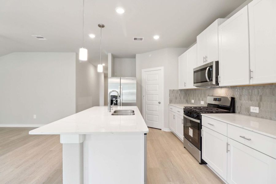 Furnished interior view inside a new home in Massey Oaks - Premier Series, Pearland (Image 9).
