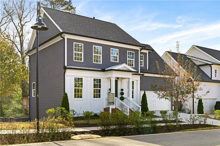 Front exterior of a new home in Harmony, Auburn, GA, highlighting curb appeal (Image 2).