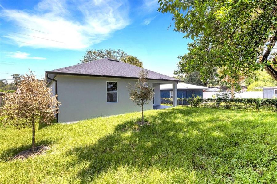 Front exterior of a new home in , Tampa, FL, highlighting curb appeal (Image 2).