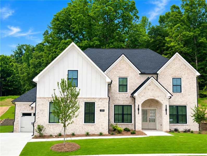 Front exterior of a new home in , Buford, GA, highlighting curb appeal (Image 1). Front exterior of a new home in , Buford, GA, highlighting curb appeal (Image 1).