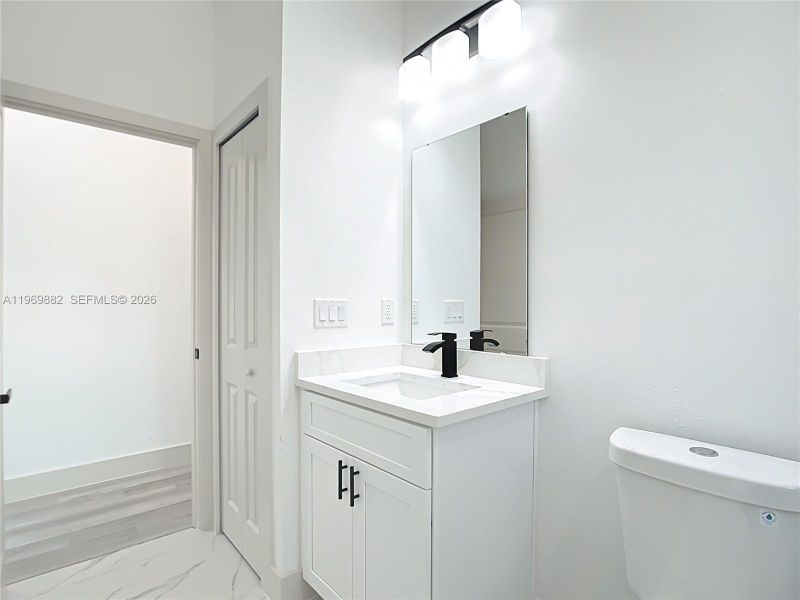 Furnished interior view inside a new home in , Port Charlotte (Image 14).