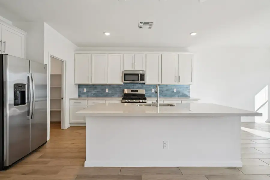 Kitchen featuring the Coastal Collection. Finishes may vary, see Sales Counselor for details