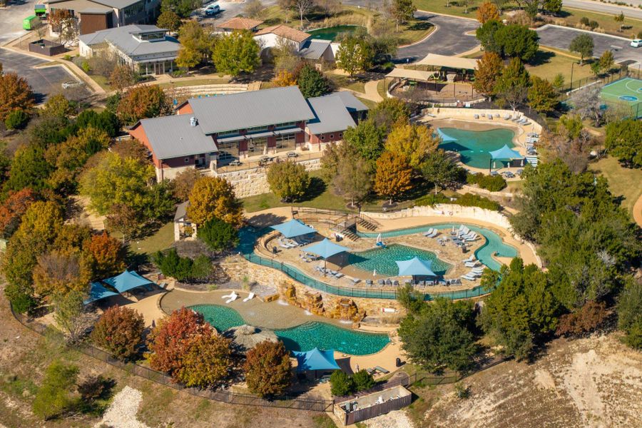 A bird’s-eye view showcases the community’s lazy river and resort-style pool complex.