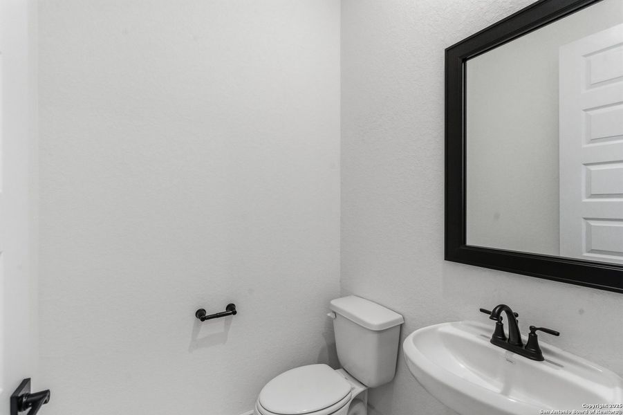 Furnished interior view inside a new home in Sienna Lakes, San Antonio (Image 12).