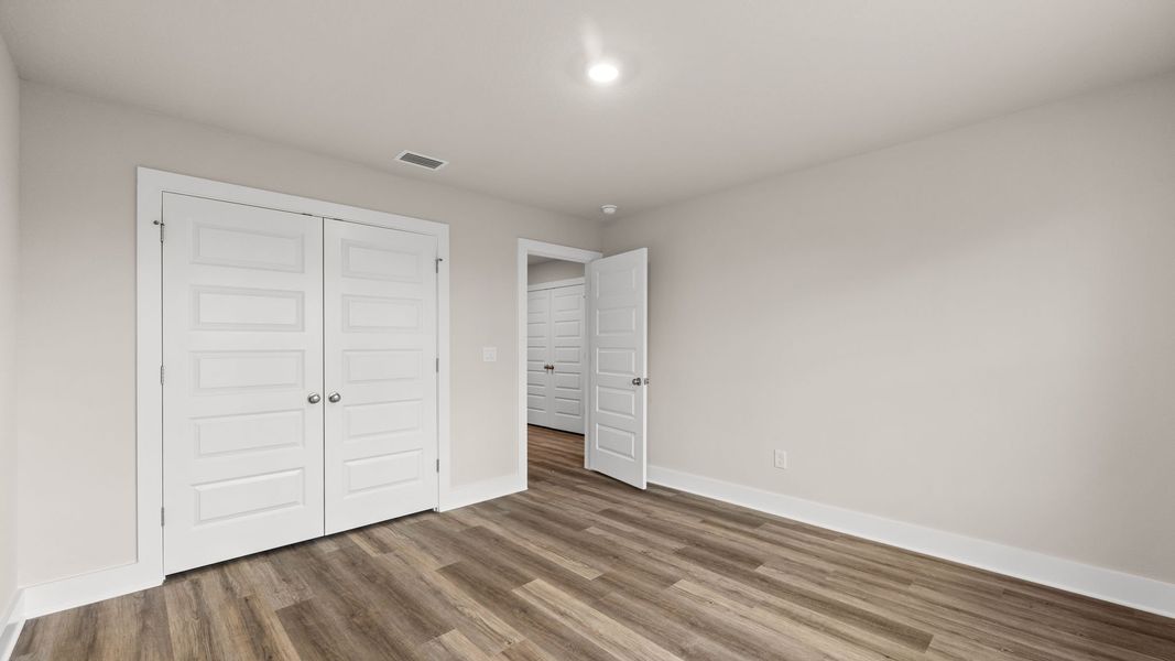 Representative unfurnished interior of a home built from the The Monroe by D.R. Horton in WindMark Beach, Port Saint Joe (Image 35).