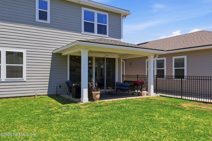 Exterior details and patio area of a home in Tributary, Yulee (Image 20).