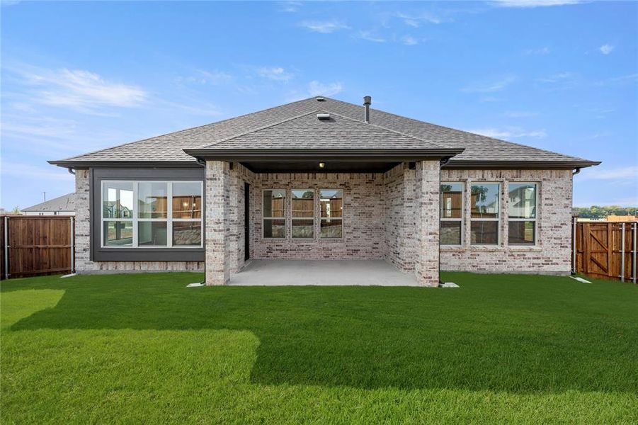 Exterior details and patio area of a home in River Ranch, Van Alstyne (Image 3). Exterior details and patio area of a home in River Ranch, Van Alstyne (Image 3).