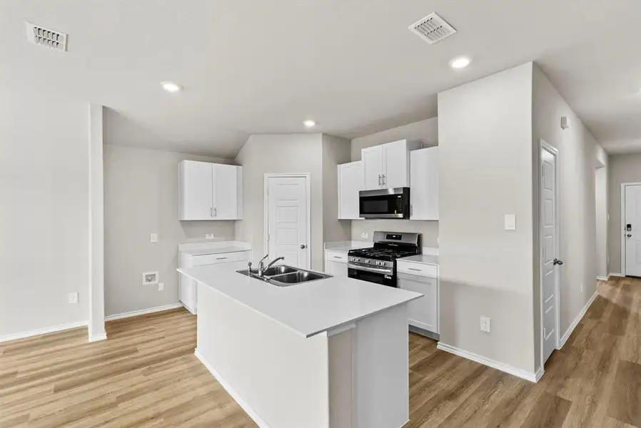 Furnished interior view inside a new home in Sunnycreek, Crowley (Image 9).