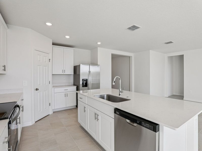 Furnished interior view inside a new home in Lake Deer Estates - Signature Series, Poinciana (Image 5).