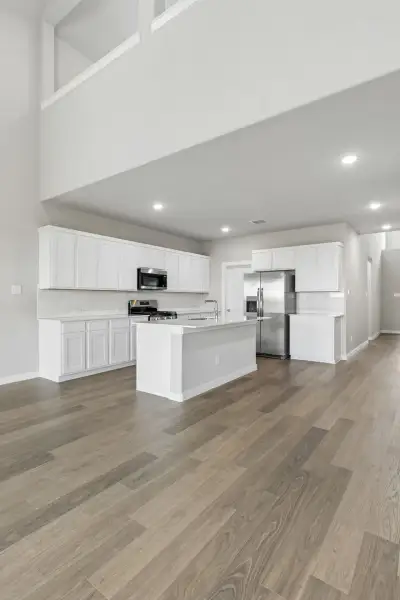Kitchen in the Winters home plan by Trophy Signature Homes – REPRESENTATIVE PHOTO
