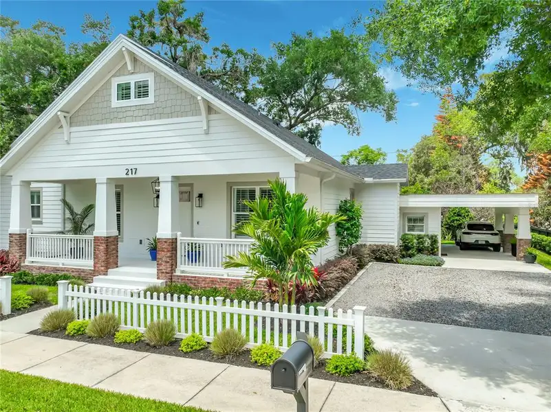 Front exterior of a new home in , Winter Garden, FL, highlighting curb appeal (Image 24). Front exterior of a new home in , Winter Garden, FL, highlighting curb appeal (Image 24).