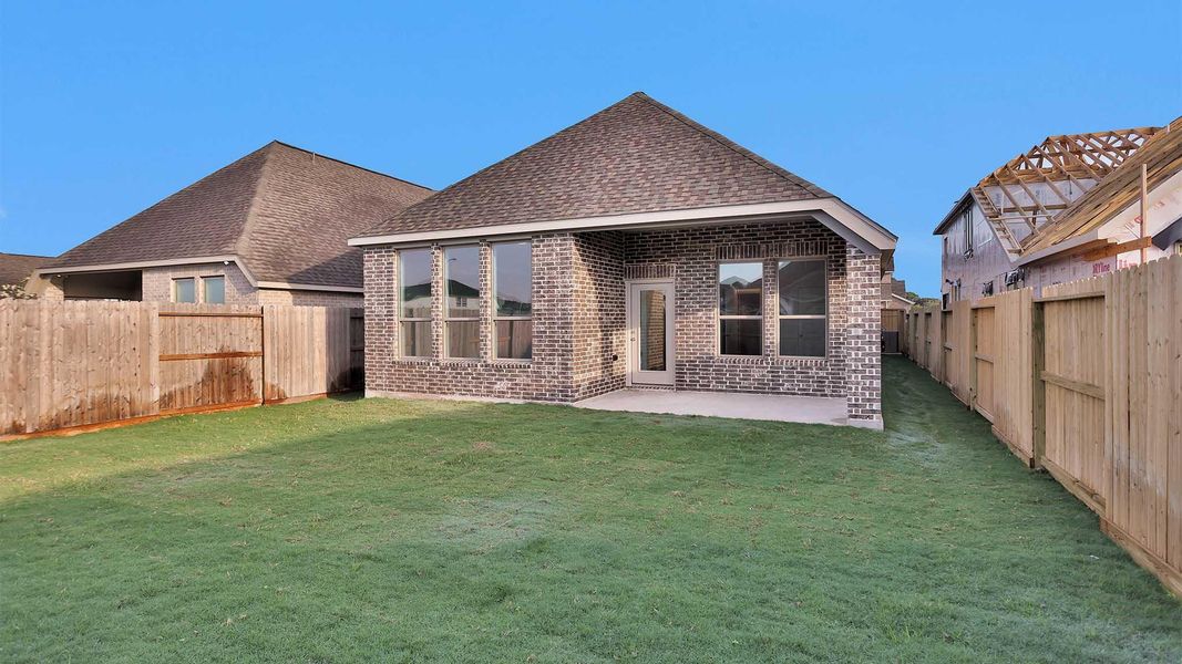 Exterior details and patio area of a home in Candela 40', Richmond (Image 2). Exterior details and patio area of a home in Candela 40', Richmond (Image 2).