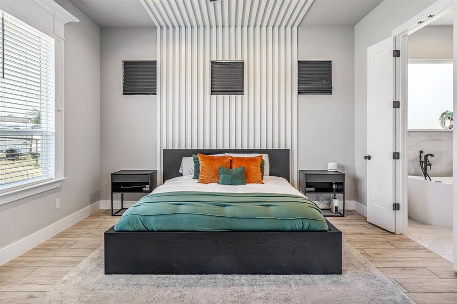 Bedroom with light wood-style flooring