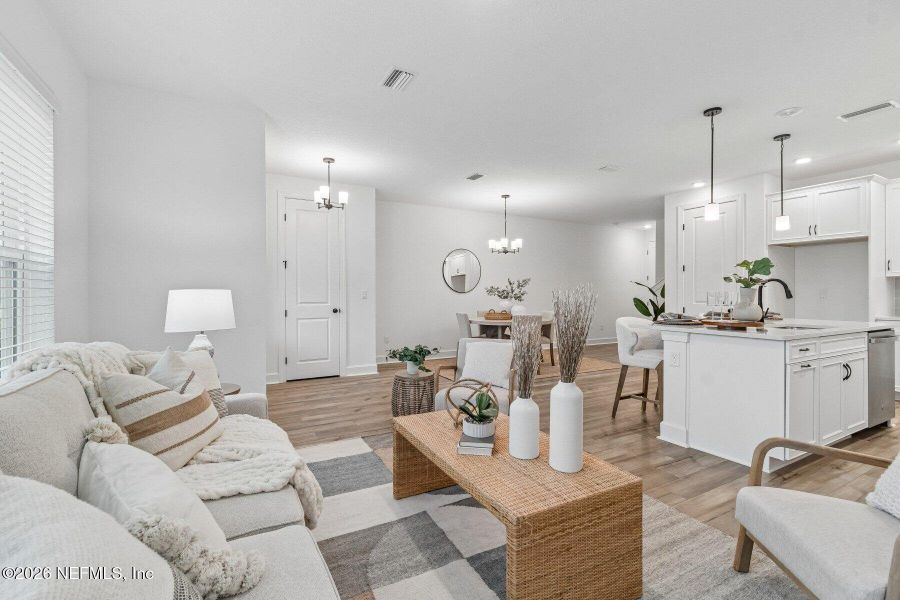 Furnished interior view inside a new home in Westerly Park at Wildlight - Courtyard Collection, Yulee (Image 9).