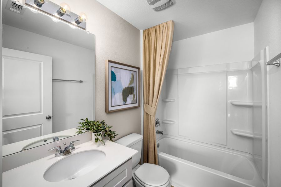 Representative furnished interior of a home built from the Sandalwood by Pulte Homes in Woodside, Georgetown (Image 5).