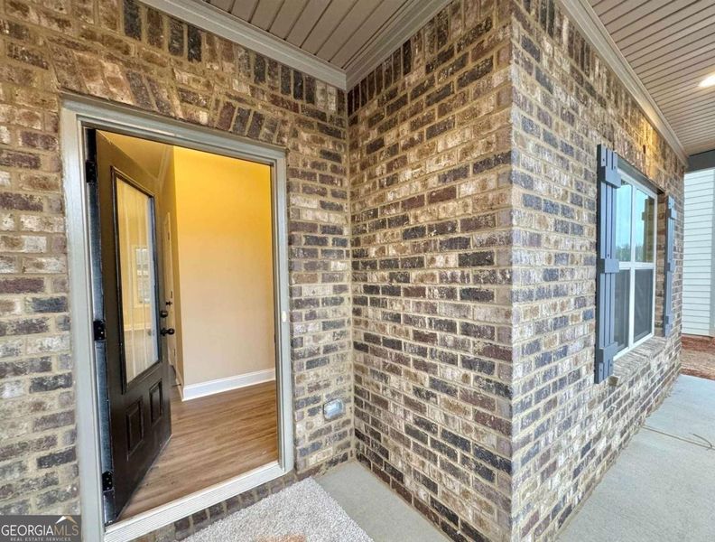 Exterior details and patio area of a home in Garden Walk, Jackson (Image 3).