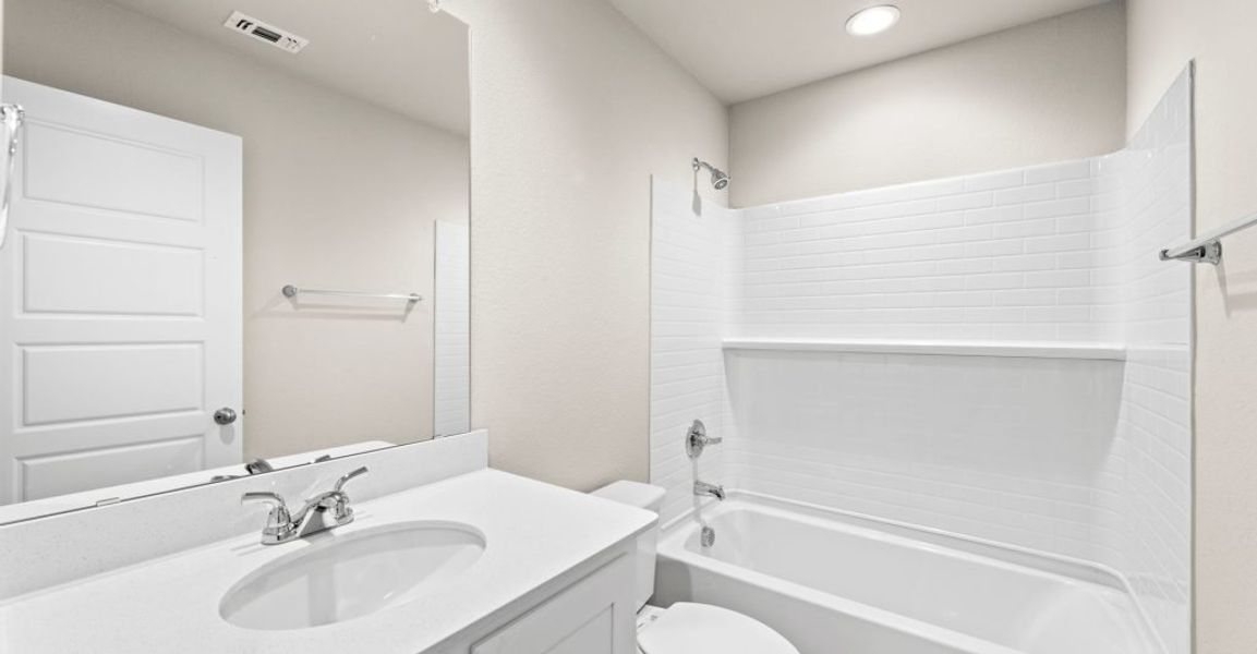 Representative exterior photo of a completed home built from the Lincoln by Impression Homes in Keeneland, Aubrey, TX (Image 21). Representative exterior photo of a completed home built from the Lincoln by Impression Homes in Keeneland, Aubrey, TX (Image 21).