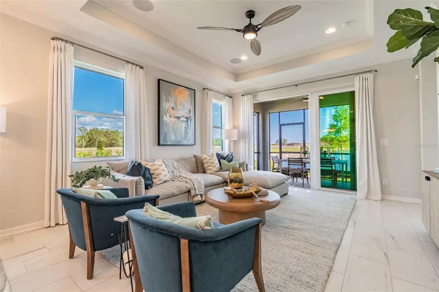 Furnished interior view inside a new home in Kings Gate, Port Charlotte (Image 5).