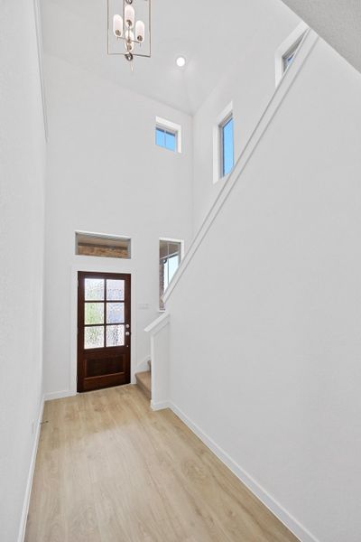 Entry in the Oak home plan by Trophy Signature Homes – REPRESENTATIVE PHOTO Entry in the Oak home plan by Trophy Signature Homes – REPRESENTATIVE PHOTO