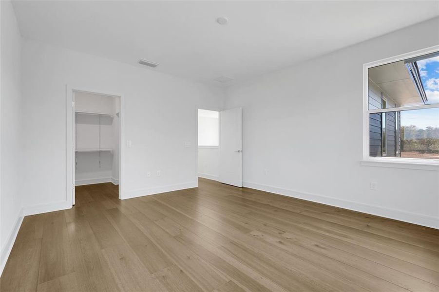 Spacious, unfurnished interior of a new home in Hampton Green at Providence, Davenport (Image 49).
