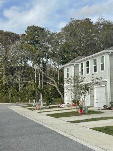 Front exterior of a new home in , New Port Richey, FL, highlighting curb appeal (Image 20). Front exterior of a new home in , New Port Richey, FL, highlighting curb appeal (Image 20).
