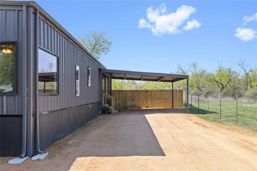 Exterior details and patio area of a home in , Brownwood (Image 24).