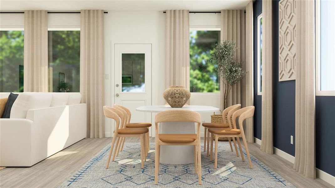 Dining space featuring light hardwood / wood-style floors