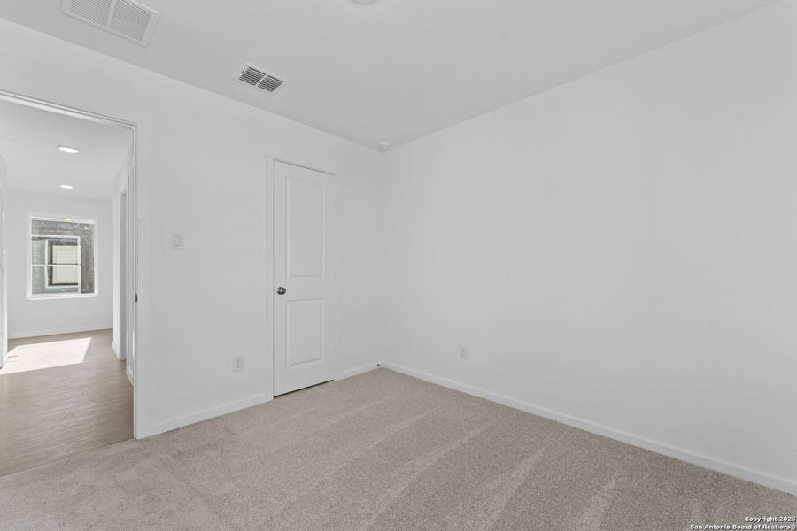 Spacious, unfurnished interior of a new home in Randolph Crossing: Cottage Collection, Converse (Image 16).