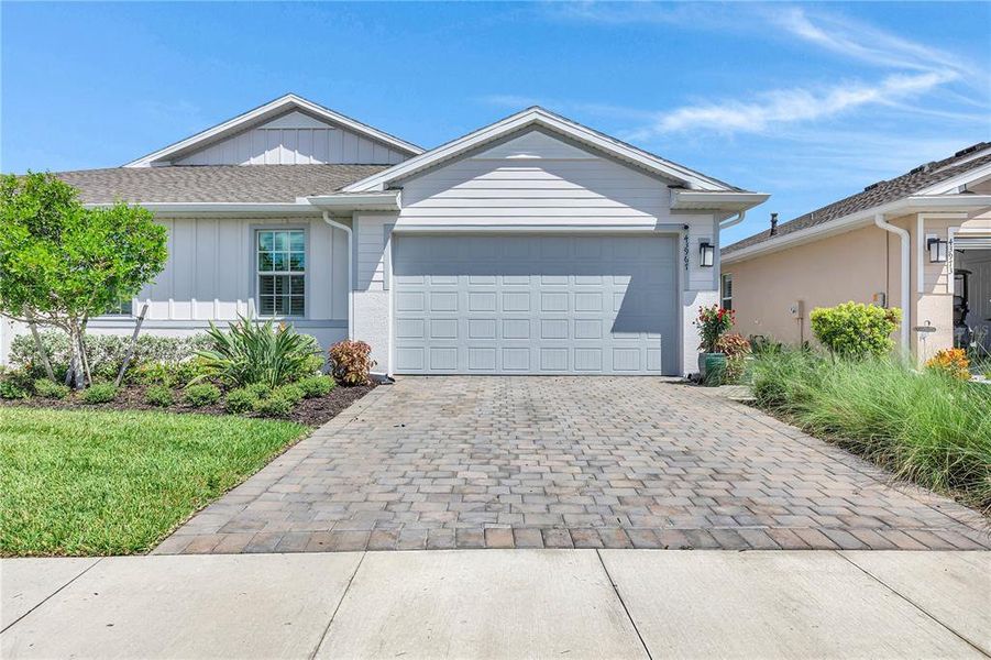 Front exterior of a new home in , Punta Gorda, FL, highlighting curb appeal (Image 20).
